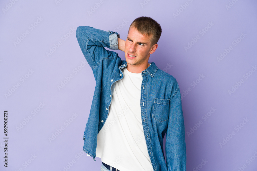 Young caucasian handsome man suffering neck pain due to sedentary lifestyle. Young caucasian handsome man suffering neck pain due to sedentary lifestyle.