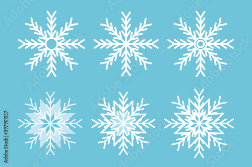Snowflakes set in beautiful style. Flakes vector illustration. Blue background vector. Isolated vector illustration. Winter background. Traditional winter holiday.