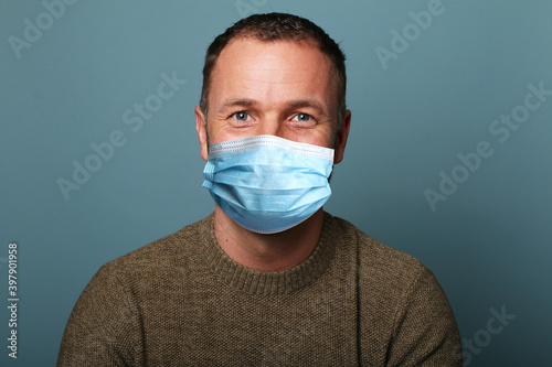 Beautiful man wearing a mouth mask