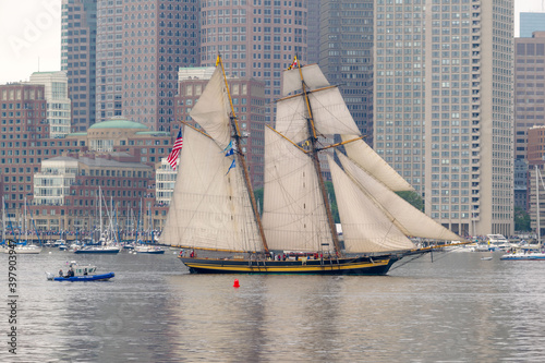 A schooner sails into Boston Harbor photo