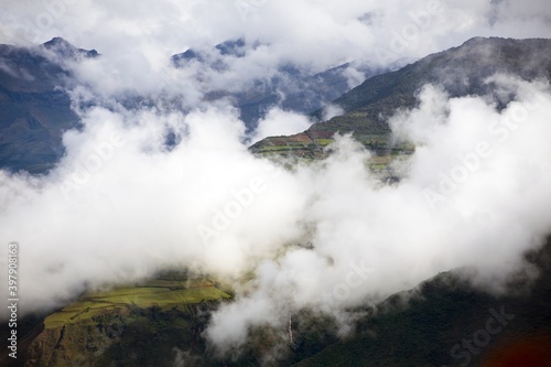 Village and terraced field in the middle of clouds peru © Daniel Prudek