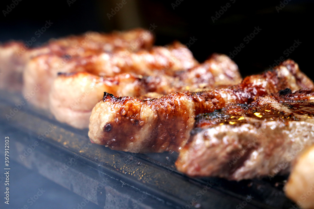 Picanha. Traditional Brazilian meat for barbecue. On wooden background. 