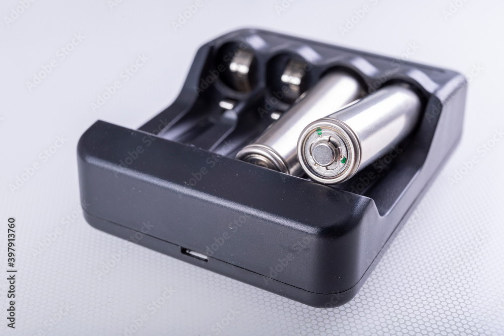 Black battery charger. Accessories for storing energy. Black battery charger. Accessories for storing energy.