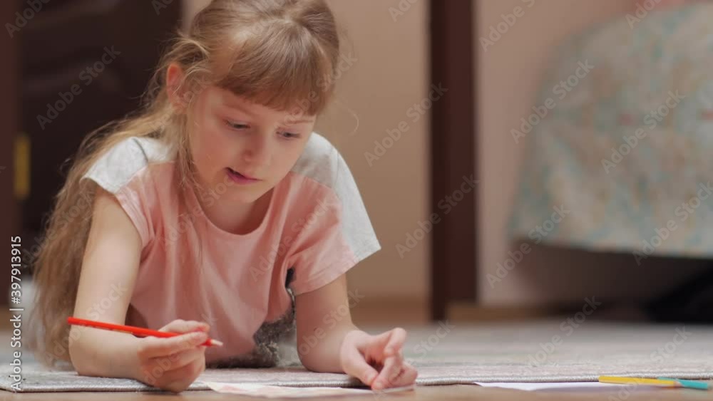 Little girl draw 7 years old caucasian white closeup Little girl draw 7 years old caucasian white closeup