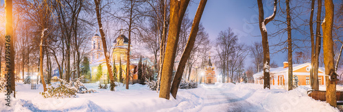 Gomel, Belarus. City Park In Winter Night. Peter And Paul Cathedral And Chapel-tomb Of Paskevich (1870-1889 Years). Rumyantsevs And Paskeviches Park. Famous Local Landmark In Snow. Panorama