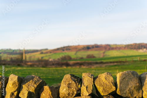 stone wall in the fields photo