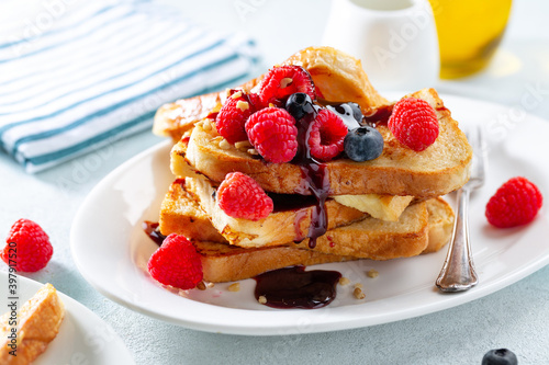 French toasts with fruits served on plate