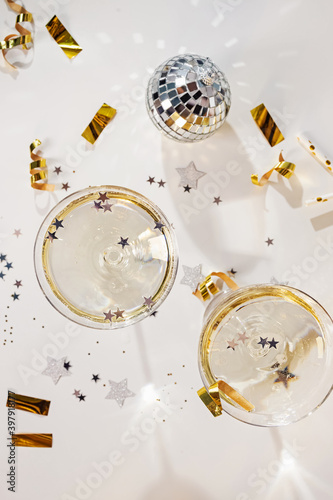 Two glasses of champagne in a coupe glasses