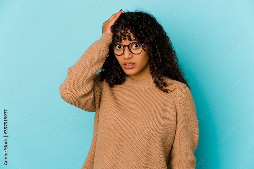 Young african american afro woman isolated being shocked, she has remembered important meeting. Young african american afro woman isolated being shocked, she has remembered important meeting.