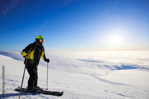 Freeride skier in mountains