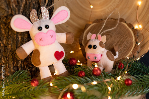 Christmas toys on the handmade Christmas tree. themed decor for a cozy home. new year concept. handmade bull © Oleksandra Derkach