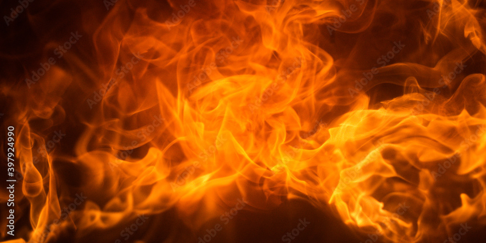 Fire flame background. Burning fireplace. Fireplace texture. Abstract flames, Burning concept.