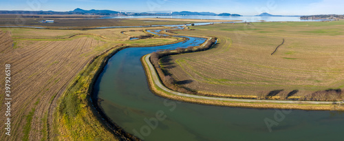 Padilla Bay Trail, Mt. Vernon, Washington. This estuary at the saltwater edge of the Skagit River delta is eight miles long and three miles across where the Skagit River meets the Salish Sea. photo