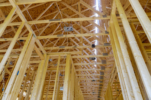 Fototapeta Naklejka Na Ścianę i Meble -  Interior with wood framing beam of new house under construction beam wood