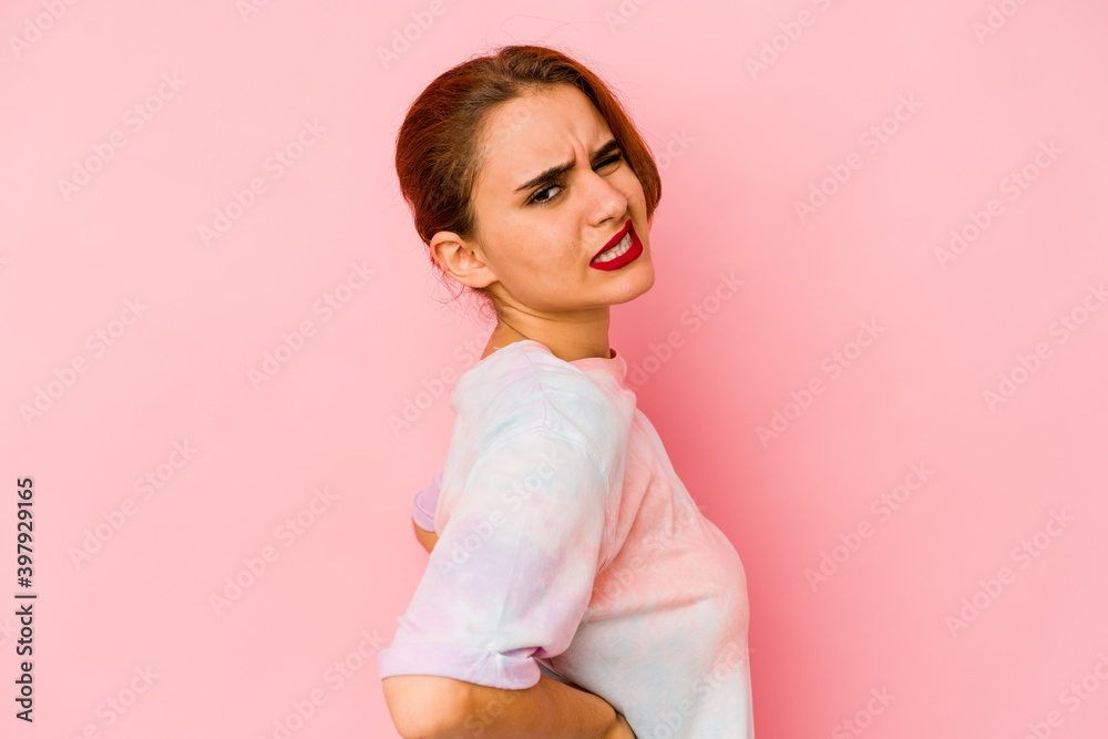 Young arab mixed race woman suffering a back pain. Young arab mixed race woman suffering a back pain.