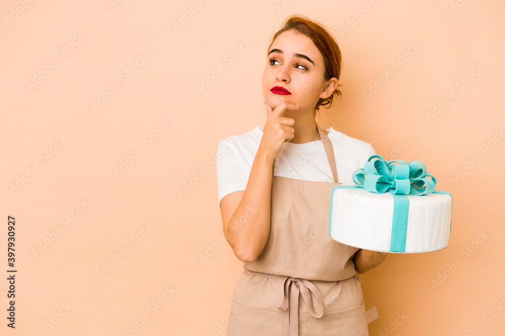 Young skinny arab pastry chef woman looking sideways with doubtful and skeptical expression. Young skinny arab pastry chef woman looking sideways with doubtful and skeptical expression.