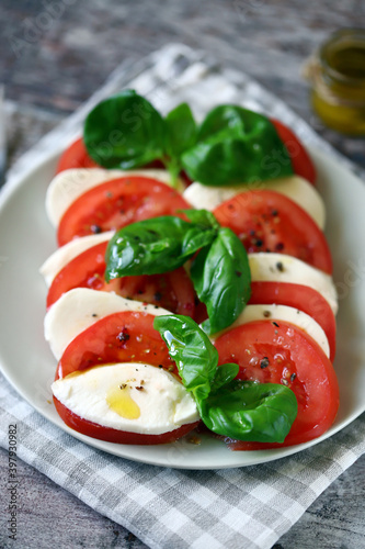 Traditional Italian caprese salad on a plate. Healthly food.