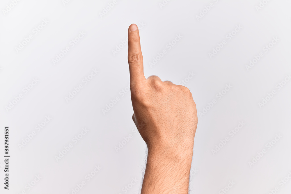 Hand of caucasian young man showing fingers over isolated white background counting number one using index finger, showing idea and understanding Hand of caucasian young man showing fingers over isolated white background counting number one using index finger, showing idea and understanding