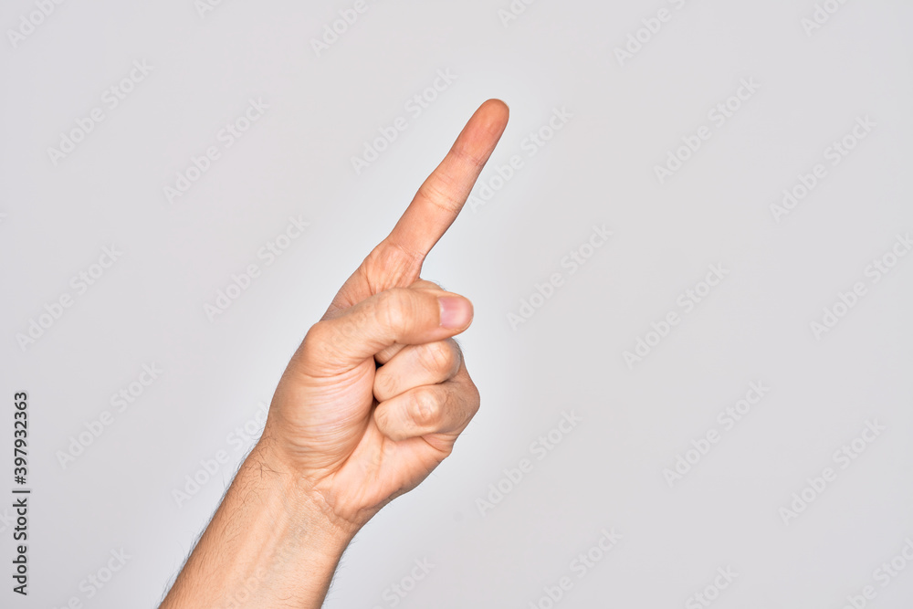 Hand of caucasian young man showing fingers over isolated white background counting number one using index finger, showing idea and understanding Hand of caucasian young man showing fingers over isolated white background counting number one using index finger, showing idea and understanding