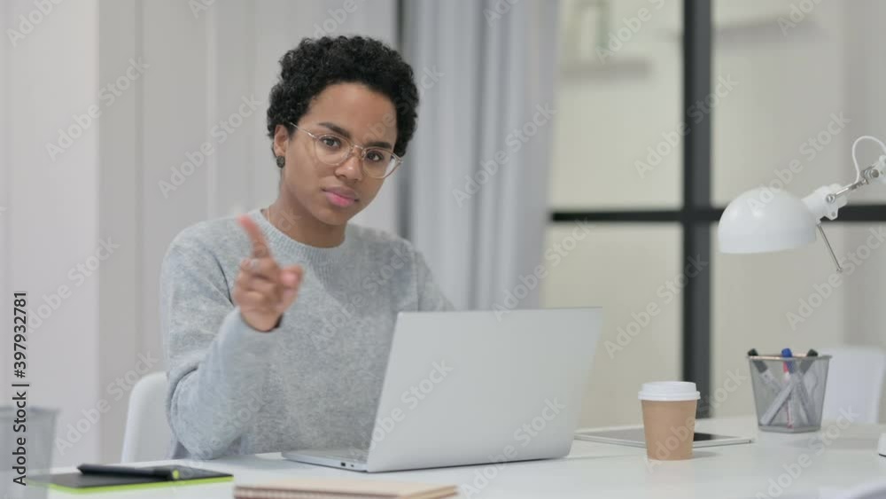 No Gesture by Young African Woman with Laptop No Gesture by Young African Woman with Laptop