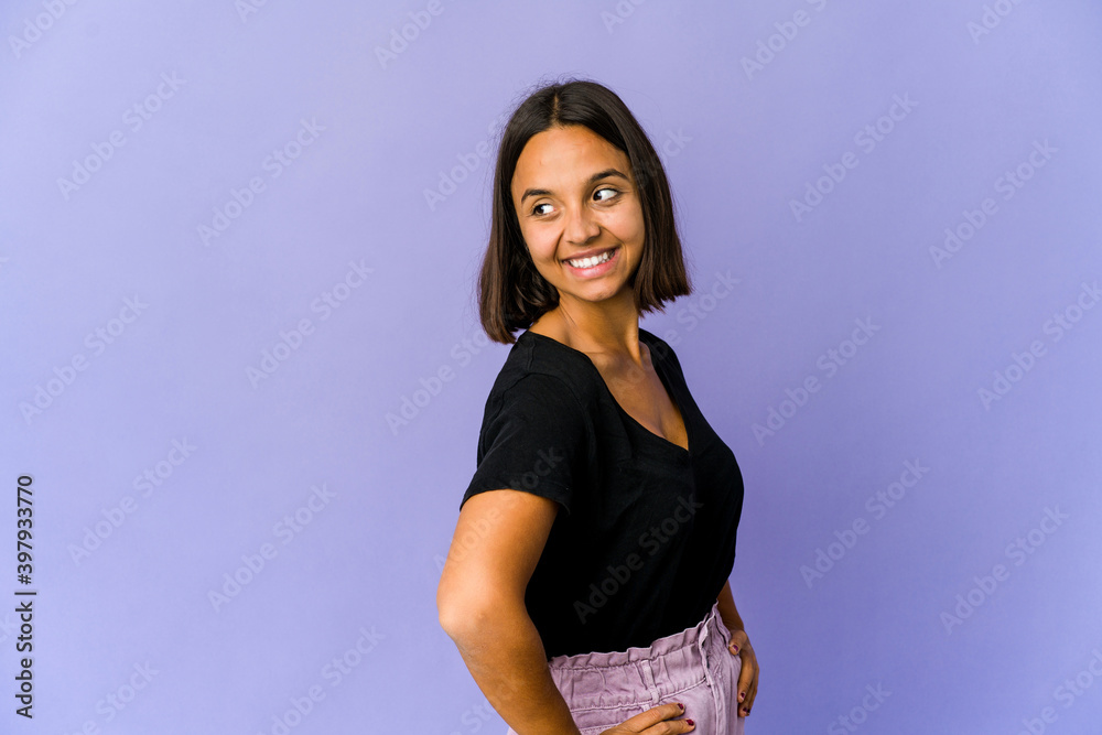 Young mixed race woman confident keeping hands on hips. Young mixed race woman confident keeping hands on hips.
