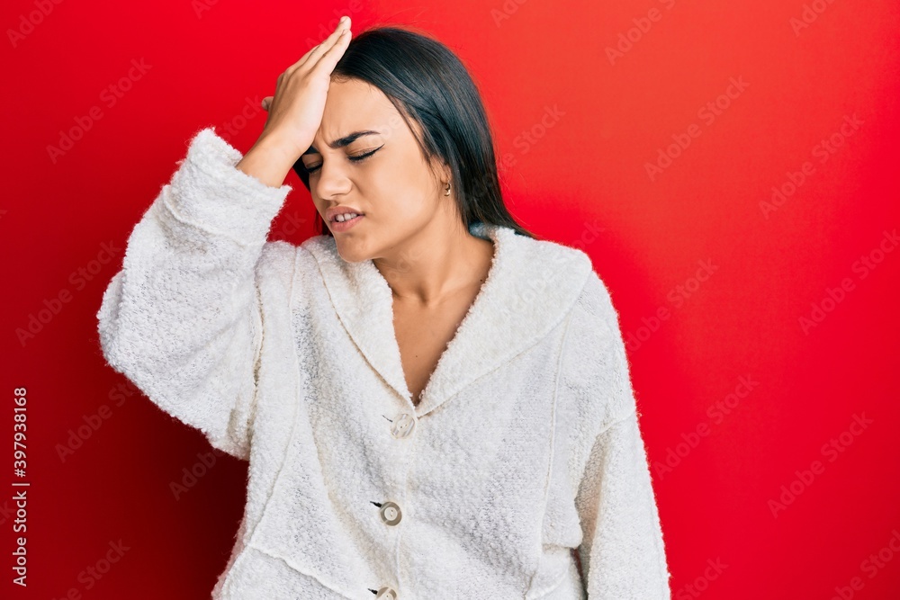 Young brunette woman wearing casual clothes surprised with hand on head for mistake, remember error. forgot, bad memory concept. Young brunette woman wearing casual clothes surprised with hand on head for mistake, remember error. forgot, bad memory concept.