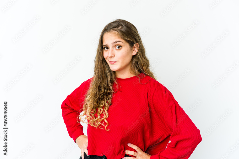 Young caucasian woman confused, feels doubtful and unsure. Young caucasian woman confused, feels doubtful and unsure.