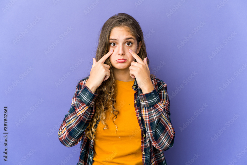 Young caucasian cute woman crying, unhappy with something, agony and confusion concept. Young caucasian cute woman crying, unhappy with something, agony and confusion concept.