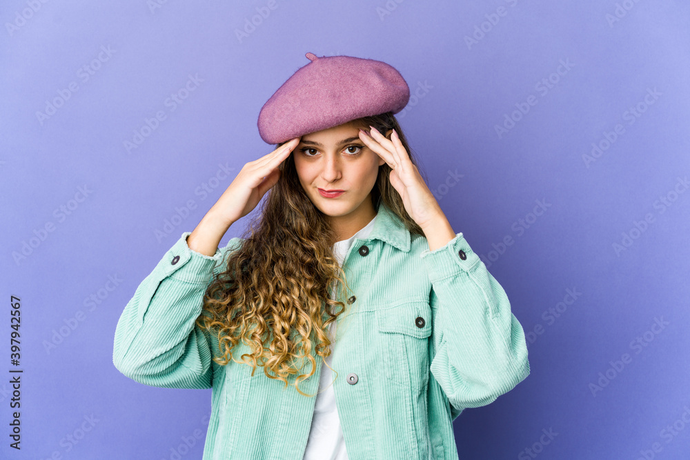 Young caucasian cute woman having a head ache, touching front of the face. Young caucasian cute woman having a head ache, touching front of the face.