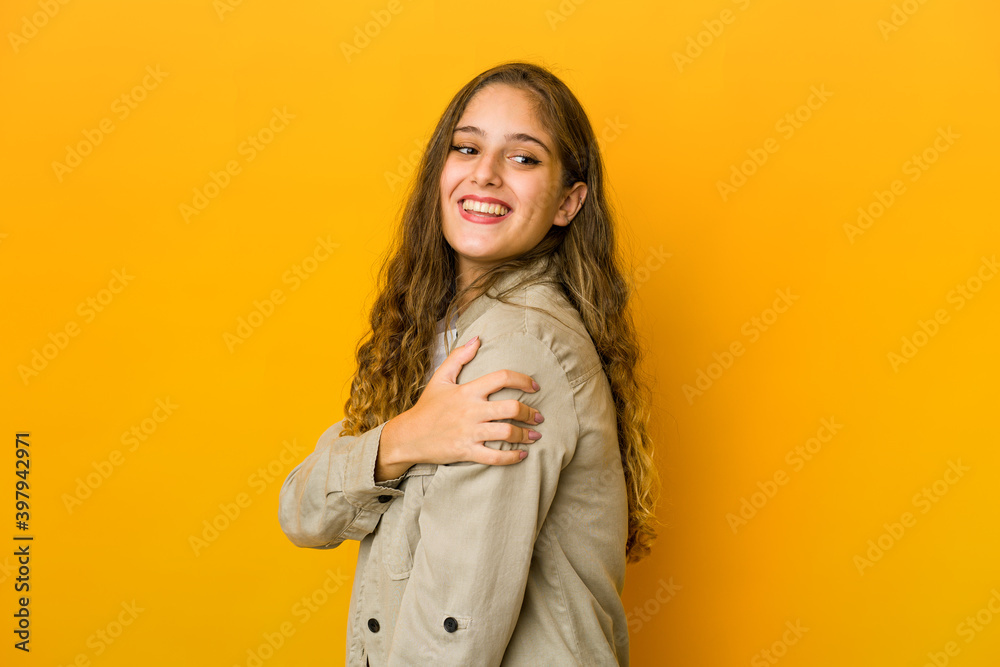 Young caucasian woman laughing and having fun.