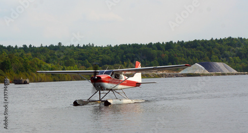 Bush plane taxiing on a northern Ontario lake