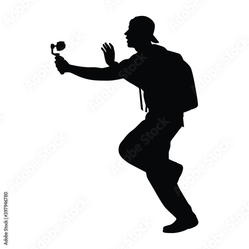 Young man with camera filming vlog silhouette vector