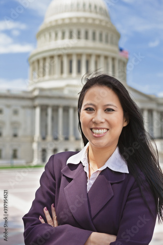 фотографія Beautiful mid adult Asian American woman in front of the U
