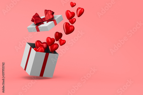 white box with red bow and ...
