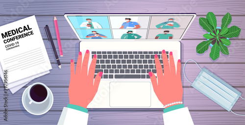 hands using laptop doctor discussing with mix race colleagues on screen doctors having medical conference medicine healthcare online communication concept horizontal portrait vector illustration