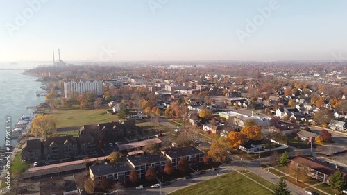 Panoramic View Of Trenton City With Colorful Autumn Landscape In Wayne County, Michigan Along Detroit River. - Aerial, Static Shot photo