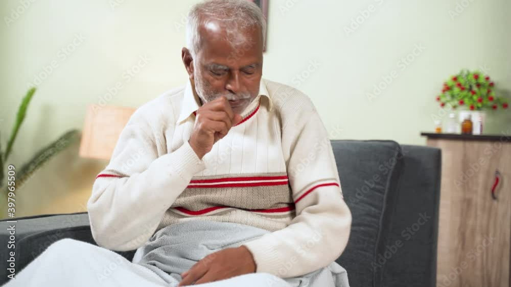 Sick old man woke up while sleeping due cough and drinks water to sleep again - concept of unhealthy, alone senior people Sick old man woke up while sleeping due cough and drinks water to sleep again - concept of unhealthy, alone senior people