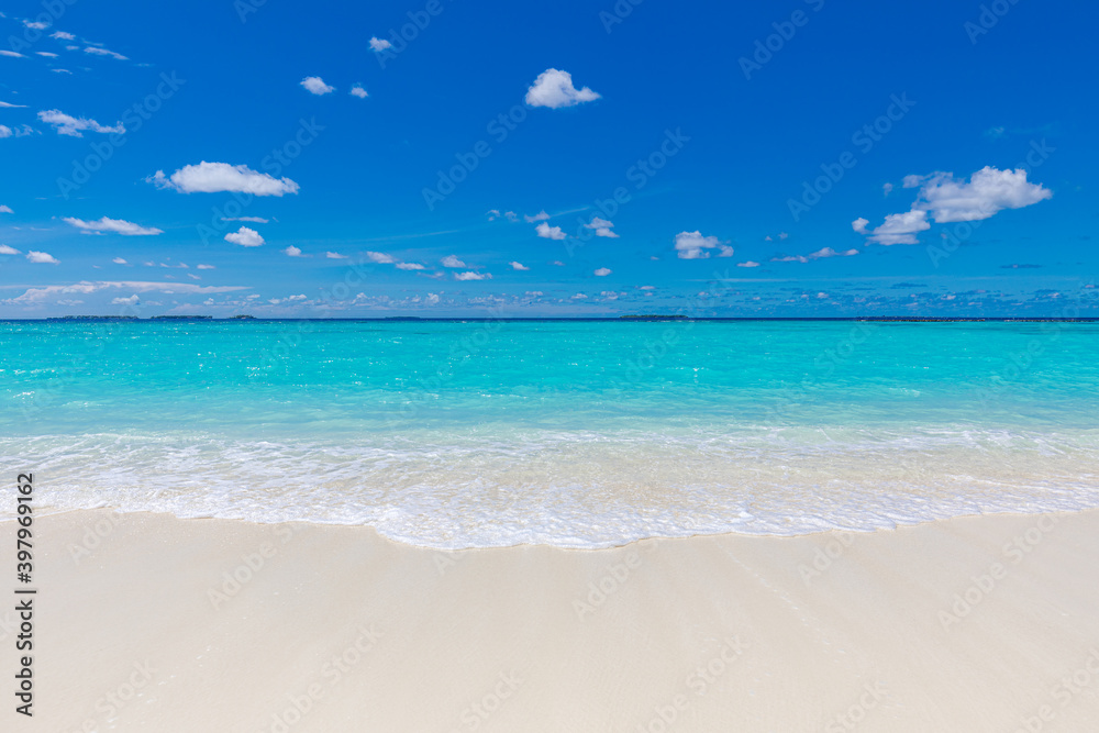 Sea sand sky concept. Closeup of sand on beach and blue summer sky, calmness and inspiration nature concept. Summer seascape beautiful waves, blue sea water in sunny day. 