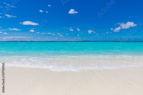 Sea sand sky concept. Closeup of sand on beach and blue summer sky  calmness and inspiration nature concept. Summer seascape beautiful waves  blue sea water in sunny day. 