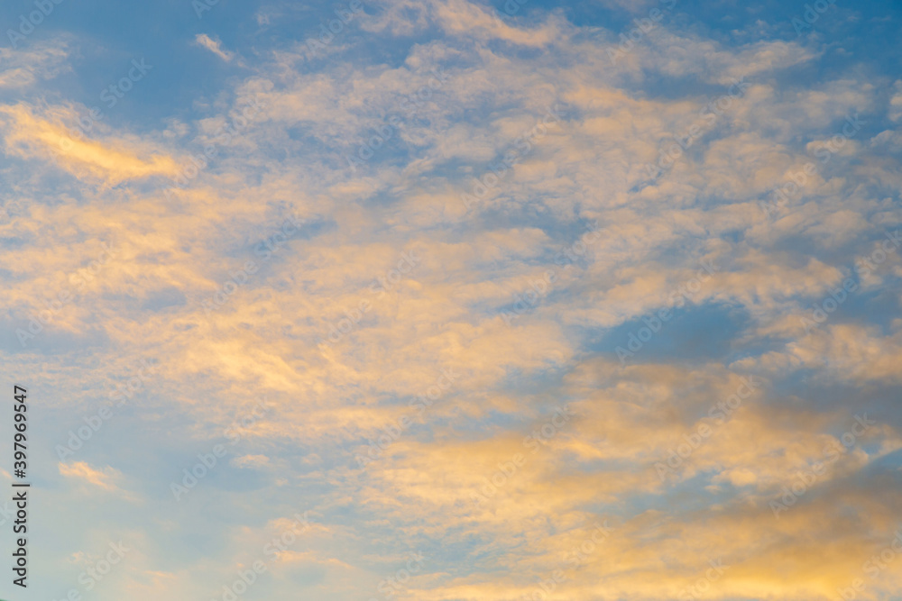 White and yellow clouds in blue sky in the morning