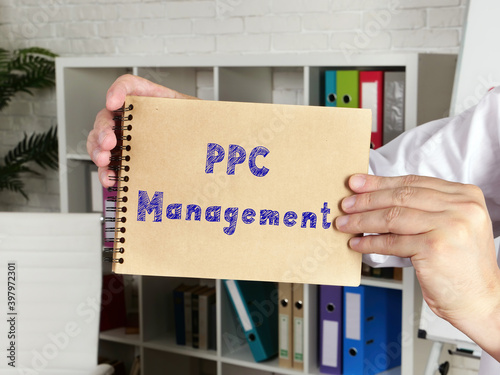 Business concept about PPC Management with sign on the page. photo