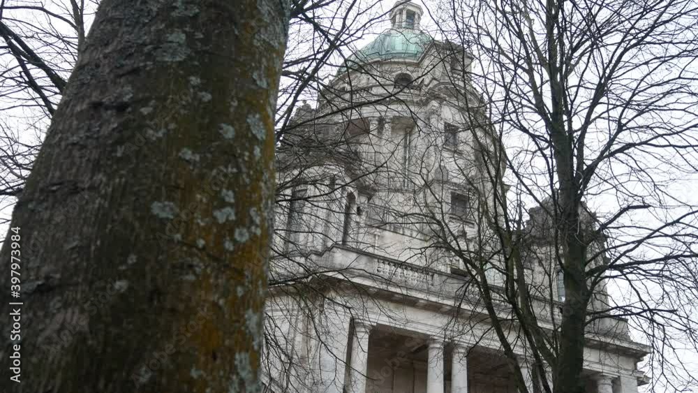 Looking up at wealthy historic Ashton memorial landmark historical estate building dolly right behind tree Looking up at wealthy historic Ashton memorial landmark historical estate building dolly right behind tree