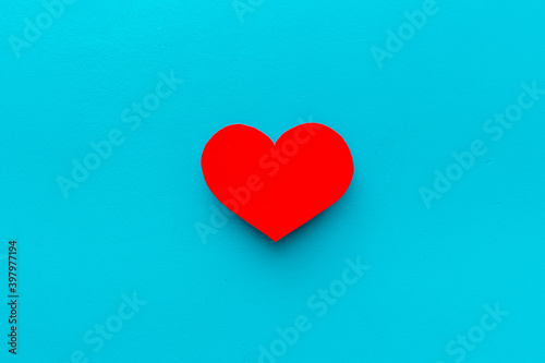 Love concept. Heart made of red paper, top view