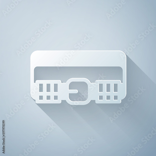 Paper cut Hunting cartridge belt with cartridges icon isolated on grey background. Bandolier sign. Hunter equipment, armament. Paper art style. Vector.