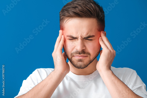 Young man suffering from he...