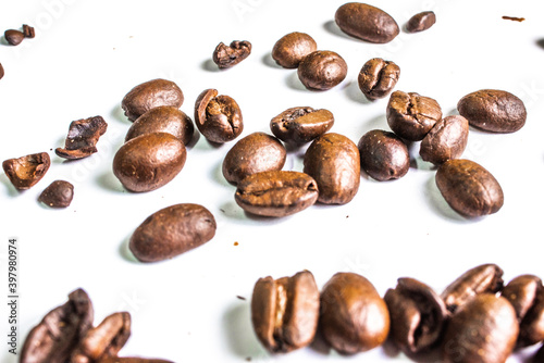 Set of fresh roasted coffee beans isolated on white background.