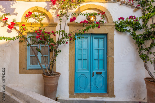 Fototapeta Naklejka Na Ścianę i Meble -  Colorful street of Skala Village in Patmos Island