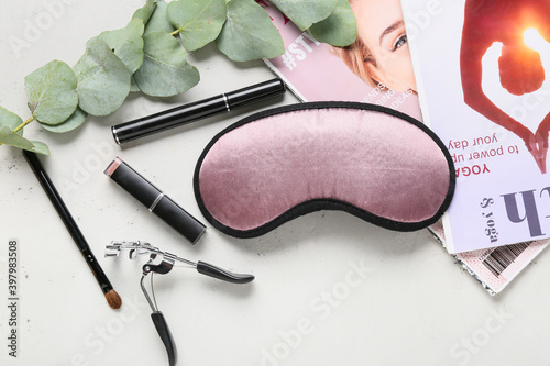 Sleep mask and cosmetics on...