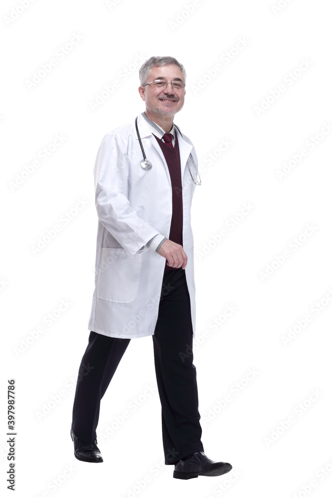 friendly doctor striding towards you. isolated on a white friendly doctor striding towards you. isolated on a white