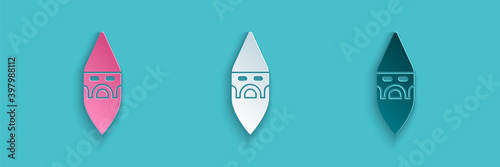 Paper cut Wizard warlock icon isolated on blue background. Paper art style. Vector.